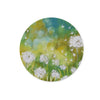 Dandelion seeds artwork design worktop saver board. Round