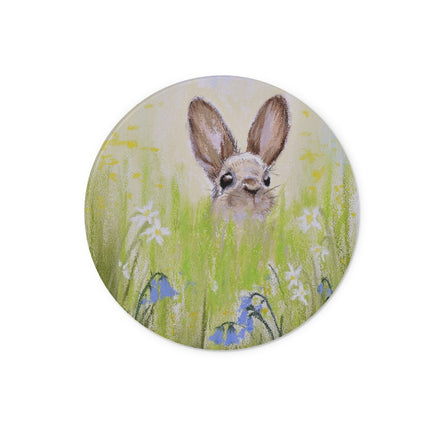 Rabbit peeking over the meadow flowers, circular chopping board