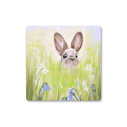 Brown rabbit peeking over the meadow flowers, drinks coasters