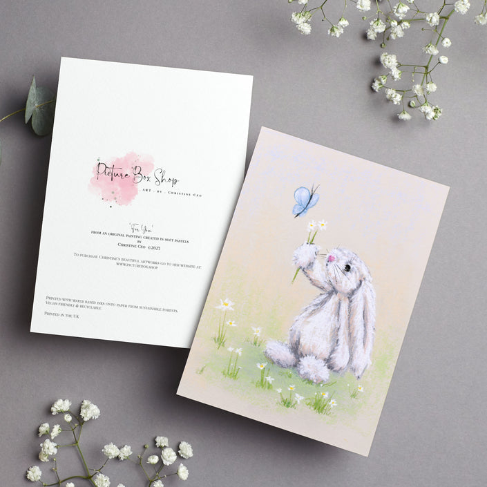 Adorable white rabbit, butterfly and daisies, art greeting card. 