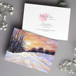 Snowy landscape at sunset, artwork greeting card. Front and back view