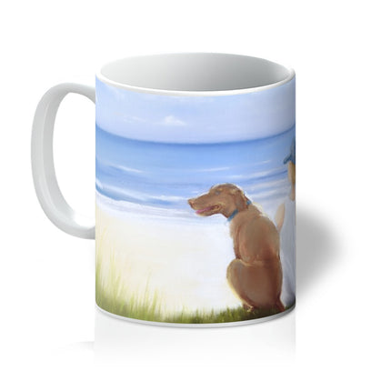 Boy and his dog at the beach, art mug