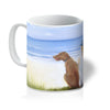 Boy and his dog at the beach, art mug