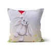 White rabbit throw cushion.