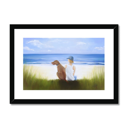 A Boy and His Dog at the beach painting. Fine art print in a black frame. Landscape orientation