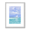 White sailing boat on calm sea artwork print in silver frame with white mount. 