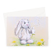 Adorable white rabbit blowing dandelion seeds, artwork greeting card. Landscape format