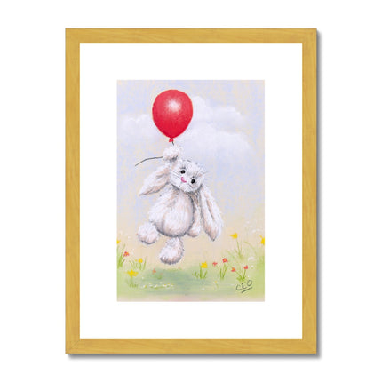 Rabbit and balloon nursery fine art print in gold frame with white mount. Portrait format