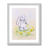 Rabbit and dandelions wall art print in a silver frame.