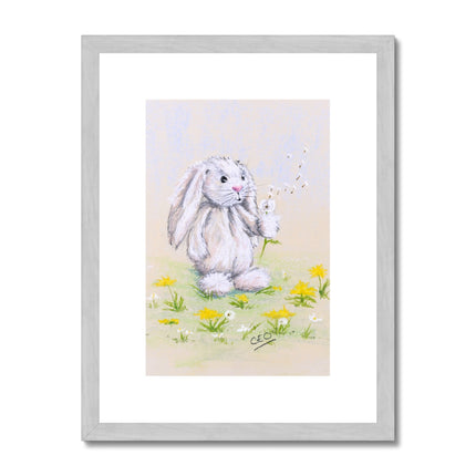 Adorable rabbit and dandelions artwork print in silver frame with white mount