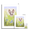 Brown Rabbit peeping over the meadow flowers and grasses artwork. Unframed canvas prints with a white border. Portrait format. Different sizes, smallest at the front.