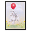 Rabbit and balloon nursery fine art canvas print in a modern black picture frame. Portrait format