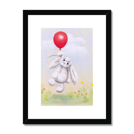 Rabbit and balloon nursery fine art print in black frame with white mount.