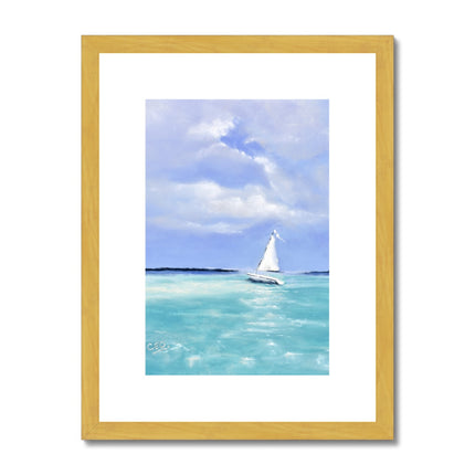 Small white sailing boat on calm sea artwork print in gold frame with white mount. Portrait orientation.