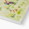 White flopsy bunny rabbit, sunshine and meadow flowers canvas art print. Bottom corner detail showing the white wrap.