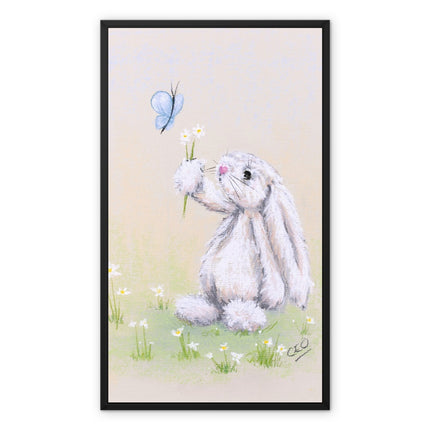 White rabbit, flowers and butterfly canvas art print within a modern black picture frame. 