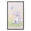 White rabbit, flowers and butterfly canvas art print within a modern black picture frame. 