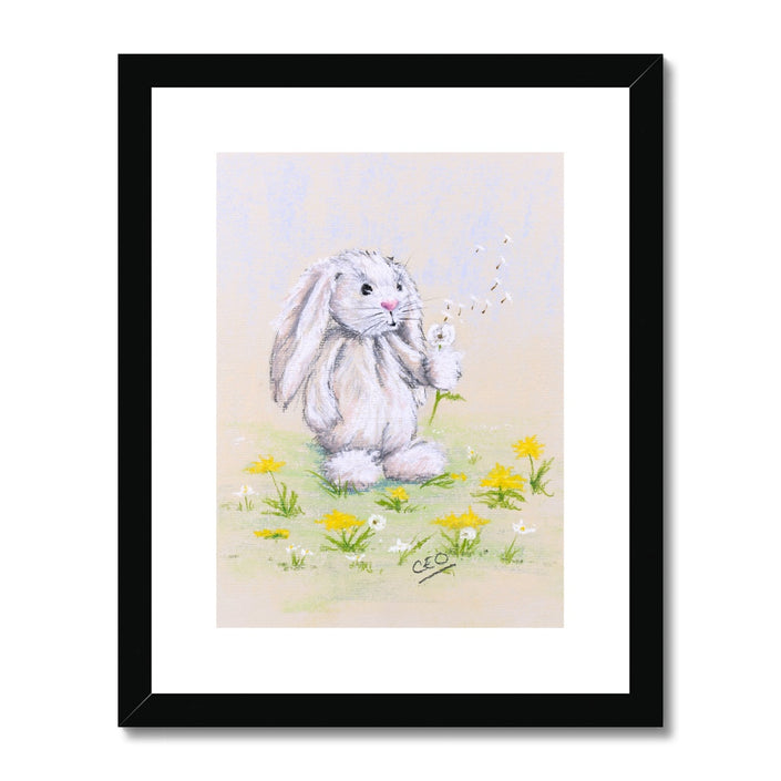 White rabbit and dandelion seeds nursery art print in black frame with white mount.