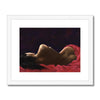 Lady draped in red velvet artwork. Fine art print in white frame with white mount.