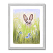 Cute rabbit and meadow flowers. Fine art print in a silver frame.