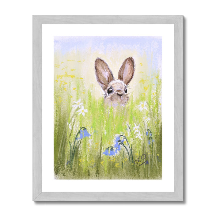 Cute rabbit and meadow flowers. Fine art print in a silver frame.