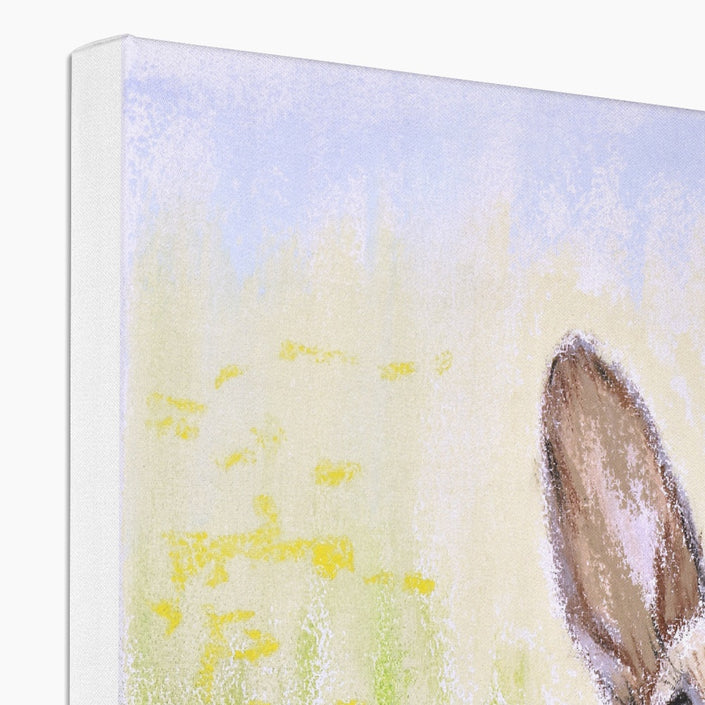 Brown Rabbit peeping over the meadow flowers and grasses artwork, canvas print. Corner detail showing the white wrap.