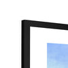 Fine art print with white border in a black frame. Top corner detail