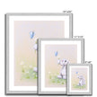 Adorable rabbit, flowers and butterfly nursery art prints in a silver frame. Portrait format. Different sizes