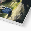 Illuminated stretched canvas nocturne landscape canvas art print. Close up of bottom corner and white wrap