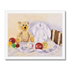 Teddy bear and white fluffy bunny toy are surrounded by Christmas Baubles, fine art print in a white frame