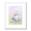 Adorable rabbit and watering can, artistic print in white frame with white mount.