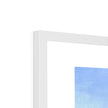 Fine art print with white border in a white frame. Top corner detail