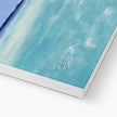 White Sailboat canvas artwork print. White wrap, bottom corner detail.