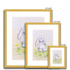 Adorable rabbit and dandelions artwork prints in a gold frame with white mount. Different sizes