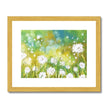 Fluffy dandelion seed heads. Fine art print in gold frame with white mount. Landscape format.