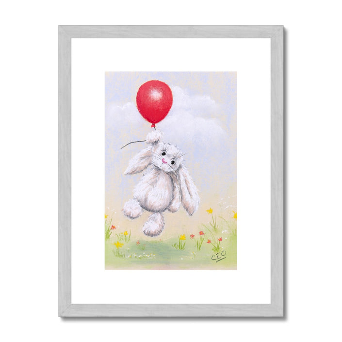 Rabbit and balloon nursery fine art print in silver frame with white mount. Portrait format