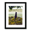 Black cat surveying the misty landscape, painting. Fine art print in a black frame with white mount