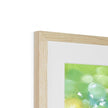 Fine art print in natural light wooden frame with white mount. Top corner detail