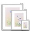 Beautiful rabbit, flowers and butterfly nursery fine art prints in silver frame with white mount. Different sizes