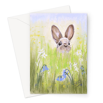 Cute brown rabbit peeping over the meadow flowers artwork greeting card. Portrait orientation