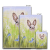 Brown Rabbit peeping over the meadow flowers and grasses artwork. Eco and Vegan-friendly canvas art prints. Different sizes.