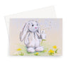 Adorable white rabbit blowing dandelion seeds, artwork greeting card. Landscape format